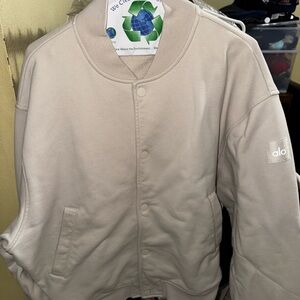ALO Yoga Men's Bomber Jacket in Light Beige